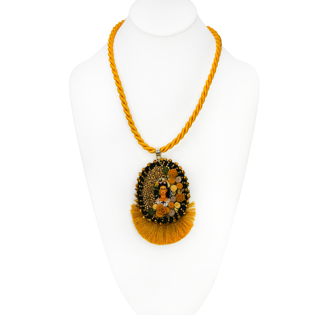Necklace with a decorative pendant on a mannequin bust against a white background