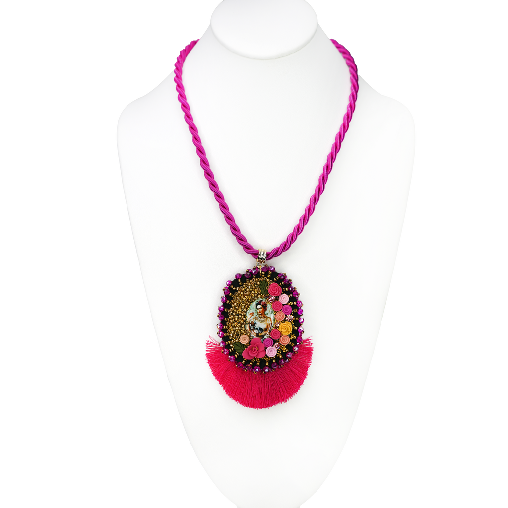 Necklace with a colorful pendant on a mannequin against a white background
