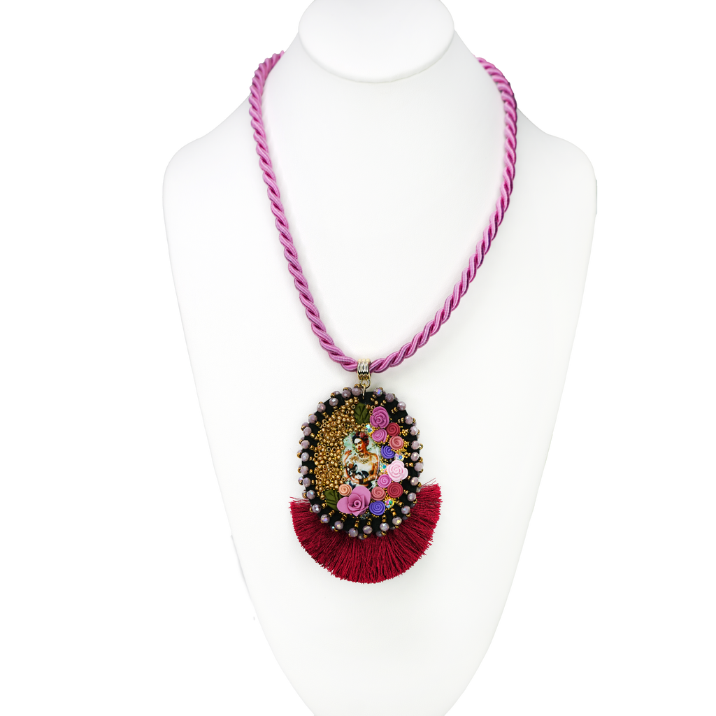 Necklace with colorful pendant on a mannequin against a white background